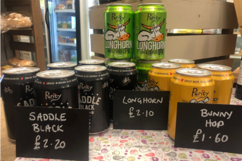 A photo of cans of Purity beer, Bunny Hop at £1.60m Longhorn at £2.10 and Saddle Black