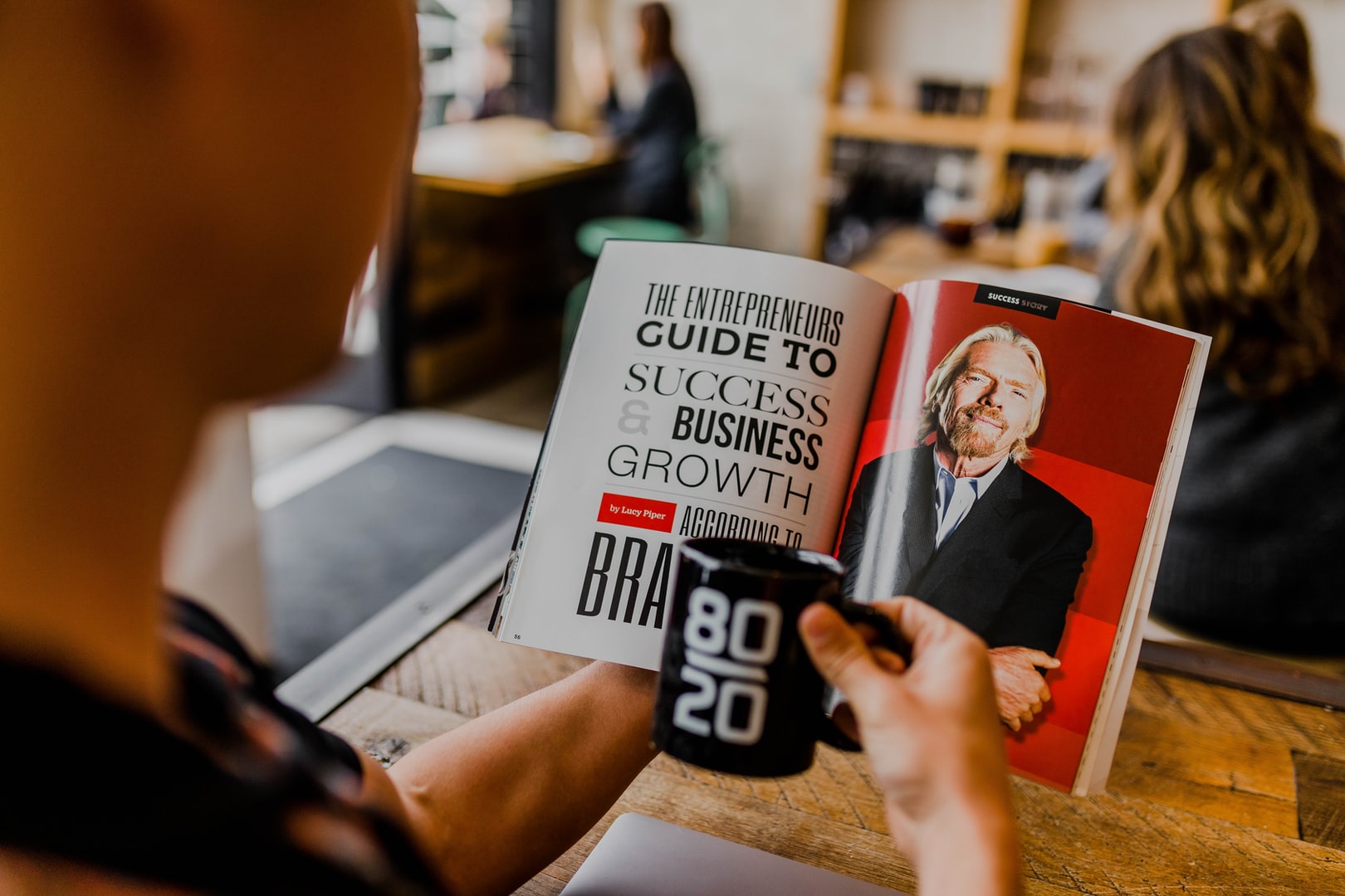 A photo of a book on business success with Richard Branson's photo