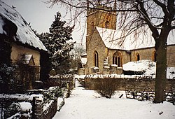 A photo of the exterior of St Leonard's Bretforton in the snow