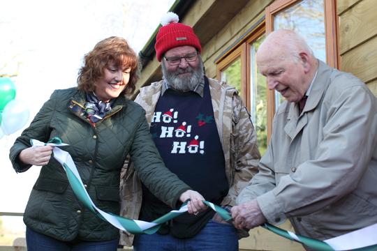 A photo of Bretforton resident and former Spitfire pilot, 92 year-old Sid Cleaver cutting the ribbon, with Bretforton asparagus grower Billy Byrd looking on