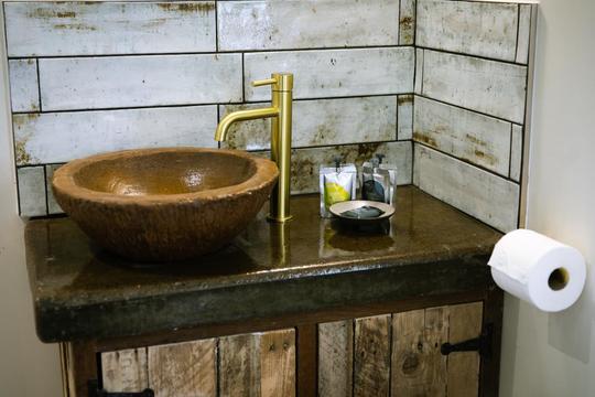 A photo of a modern, rustic tap & sink in holiday accommodation in Bretforton