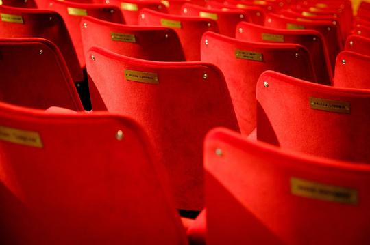A photo of upholstered theatre seats at Bretforton Theatrebarn