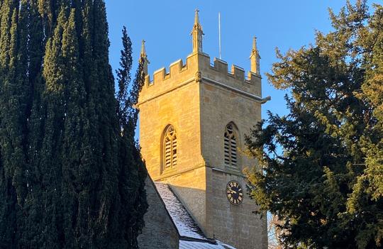 A photo of the tower and clock of St Leonard's Church Bretforton